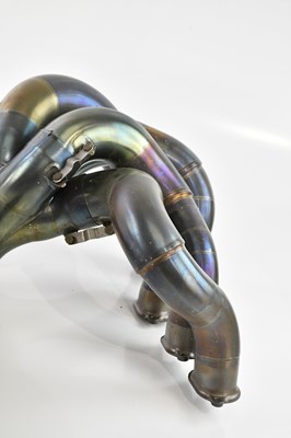 Lot 1050 - FORMULA ONE (F1) INTEREST; part of an exhaust...