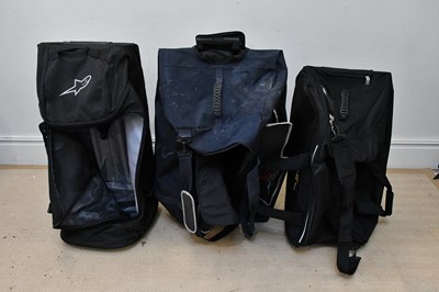 Lot 1037 - Three Formula One related luggage bags...