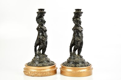 Lot 507 - PARAFFIN LIGHT CO; a pair of cast iron figural...