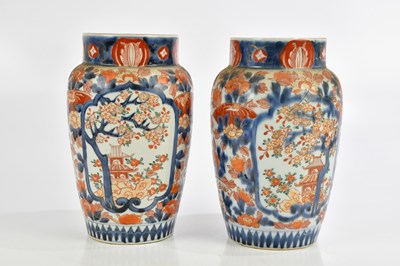 Lot 880 - A pair of 19th century Japanese Imari pattern...