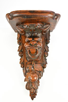 Lot 318 - A late Victorian grotesque carved oak wall...