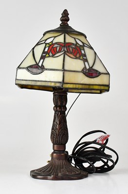 Lot 146 - A bronzed table lamp with Tiffany-style...