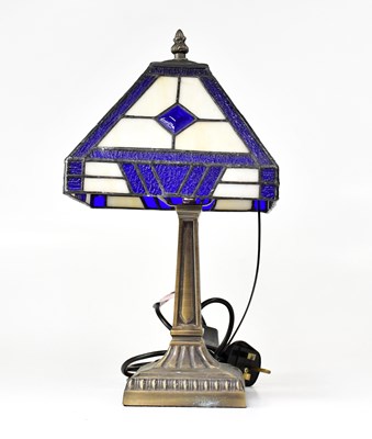 Lot 147 - A bronzed table lamp with Tiffany-style...