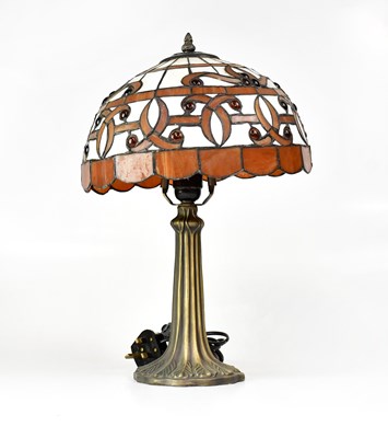 Lot 148 - A bronzed table lamp with Tiffany-style...