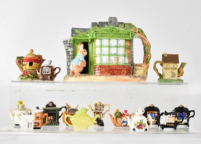 Lot 495 - PAUL CARDEW; twelve 'Tiny Teapot' models,...