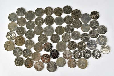 Lot 739 - A collection of sixty-one 50p coins comprising...