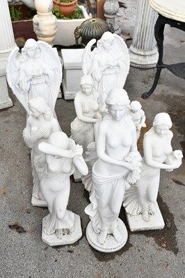 Lot 265 - Nine assorted decorative white garden statues,...