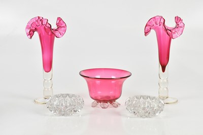 Lot 614 - A pair of cranberry glass posy vases with...