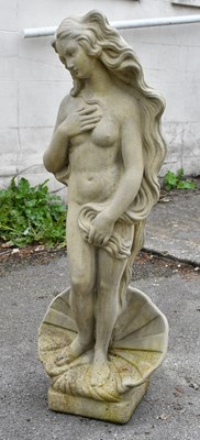 Lot 270 - A decorative composite stone garden statue of...