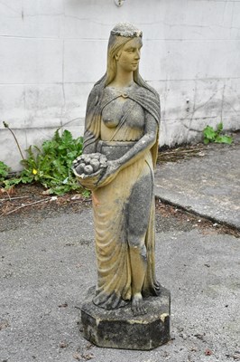 Lot 272 - A decorative composite stone garden statue of...