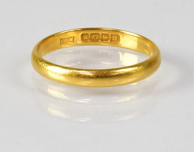 Lot 782 - A 22ct gold wedding band, size M, approx. 2.3g.