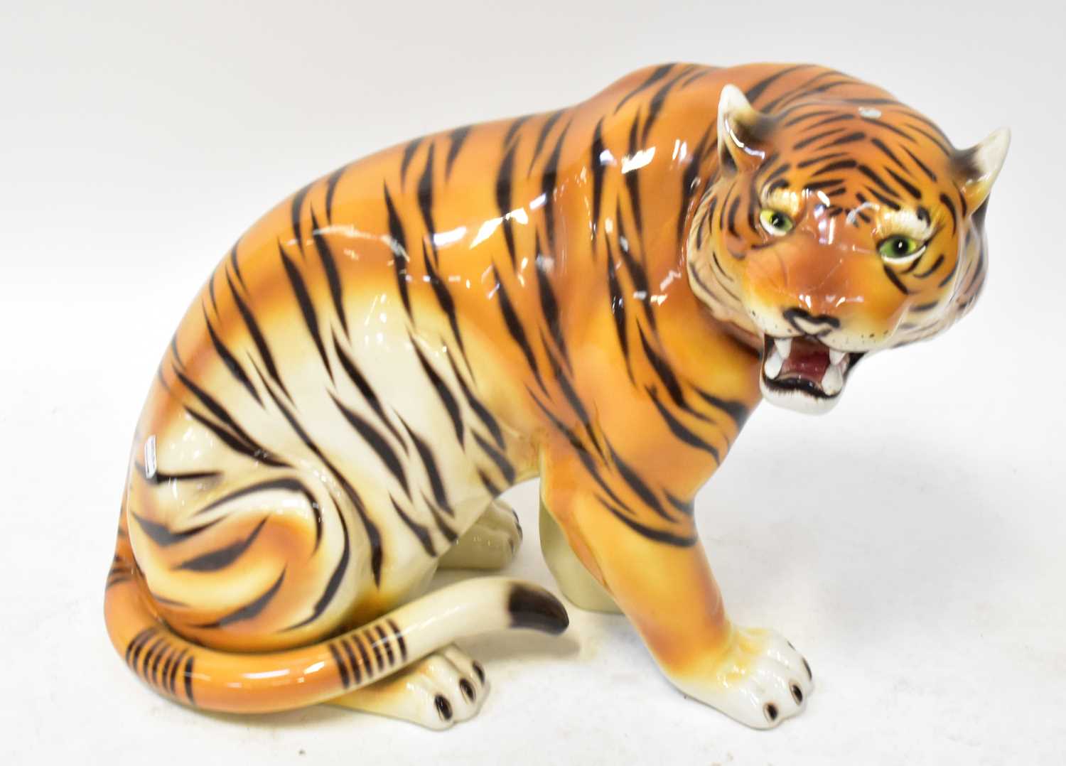 Lot 466 - A large ceramic tiger, converted to a lamp...