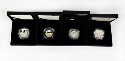 Lot 773 - THE ROYAL MINT; four silver proof coins, to...