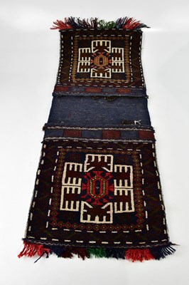 Lot 1184 - A Middle Eastern camel saddle bag.