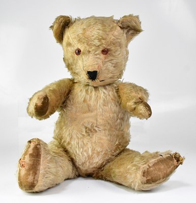 Lot 706 - An early 20th century jointed Teddy bear with...