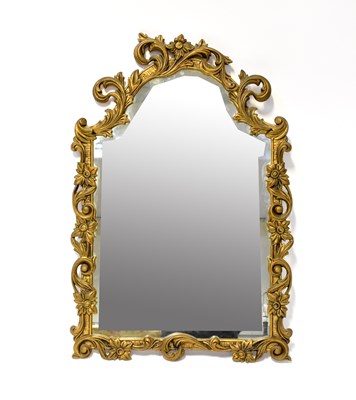Lot 85 - An ornate gilt framed Rococo-style arched...