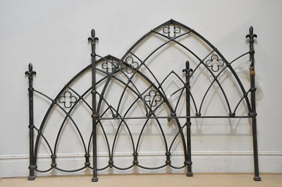 Lot 109 - A reproduction cast metal Gothic style double...