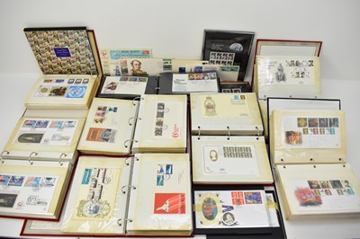 Lot 704 - Eight albums of first day covers ranging from...