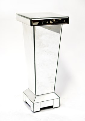 Lot 75 - A contemporary mirrored pedestal with bevel...