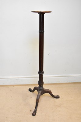 Lot 229 - A 19th century mahogany tripod torchere stand,...