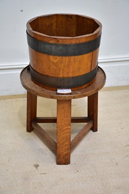 Lot 232 - A oak coopered jardiniere, height 62cm.