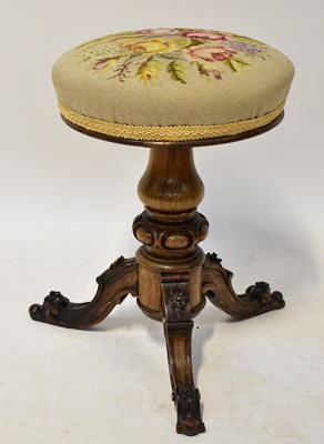 Lot 42 - A Victorian rosewood piano stool, the tapestry...