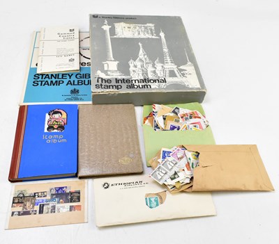 Lot 863 - World; collection of used stamps in 1 SG album plus 2 small albums and loose in envelope.