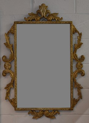 Lot 29 - A modern elaborately gilt framed rectangular...