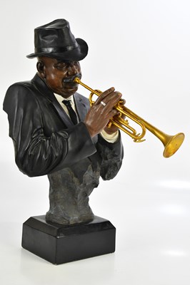 Lot 1399 - A resin bust of a trumpet player, height 57cm.