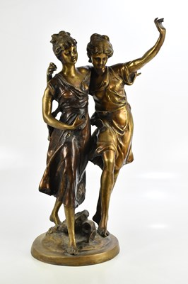 Lot 1368 - A large bronze figure group of two maidens...