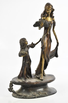 Lot 1371 - An Art Nouveau bronze figure of mother and...