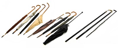 Lot 50 - A collection of eleven vintage umbrella and...