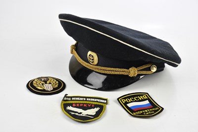 Lot 242 - A Russian Navy cap and three patches (4).