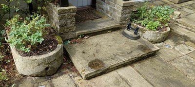 Lot 246 - A near pair of old oval shaped stone troughs,...