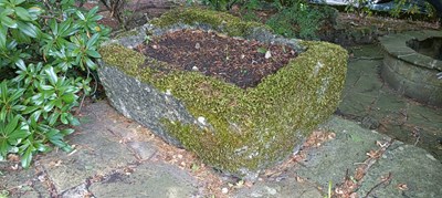 Lot 258 - An old rectangular granite trough with rounded...