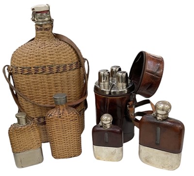 Lot 280 - A collection of flasks including silver plated...