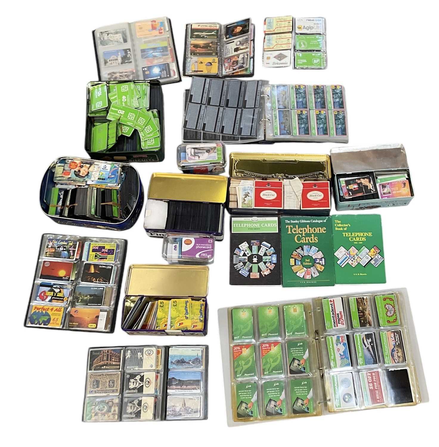 Lot 316 - A large collection of phone cards, contained