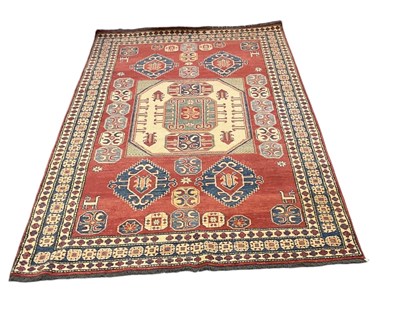 Lot 84 - A large 20th century Persian rug, with square...