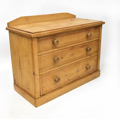 Lot 43 - A modern rustic pine chest of three drawers,...