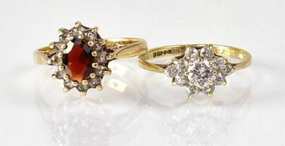 Lot 791 - Two 9ct yellow gold floral cluster rings,...