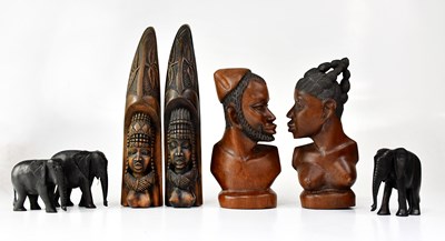 Lot 564 - A pair of African carved hardwood busts of a...