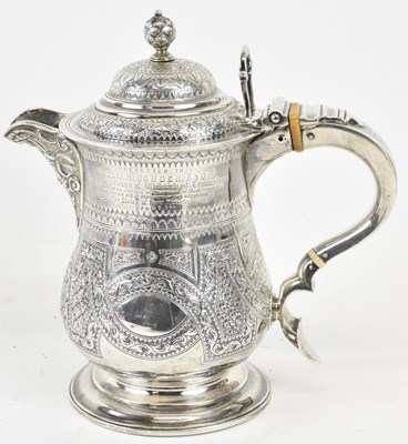 Lot 1093 - A hallmarked silver jug, previously a tankard...