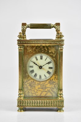 Lot 352 - A brass cased carriage clock, with white...