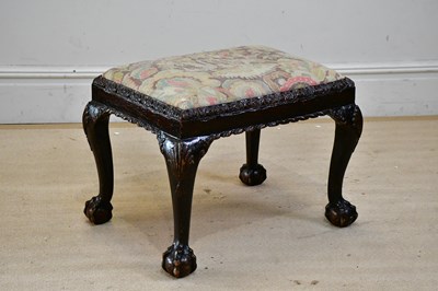 Lot 111 - A George III style carved and stained wood...