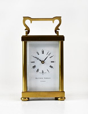 Lot 153 - MATTHEW NORMAN; a brass cased carriage clock,...