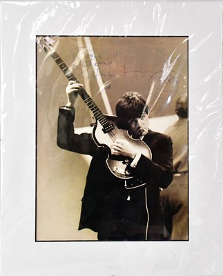 Lot 263 - PAUL MCCARTNEY; a mounted black and white...