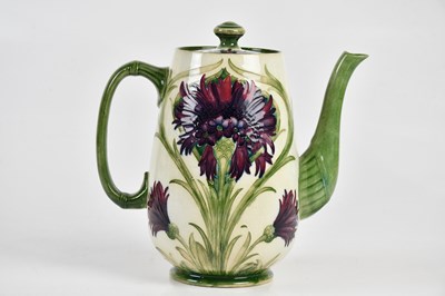 Lot 50 - WILLIAM MOORCROFT; a coffee pot in the...