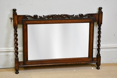 Lot 214 - A 1920's oak wall mirror, height 61cm, width...