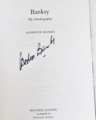 Lot 387 - BOBBY CHARLTON; four signed books, comprising...