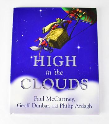 Lot 259 - PAUL MCCARTNEY; a copy of 'High in the Clouds',...